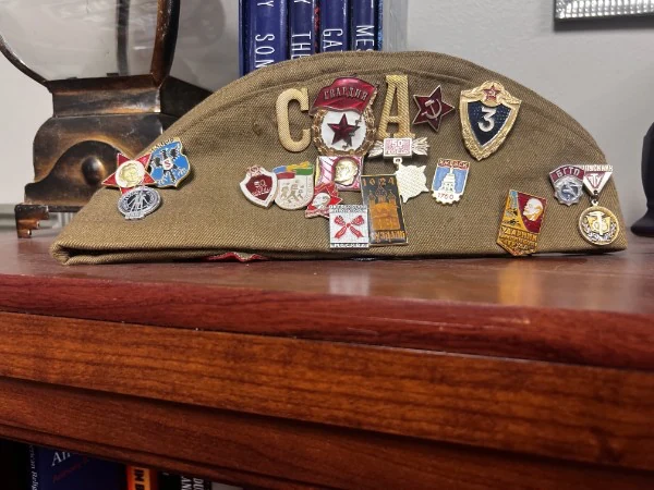 Hat from Russia with Soviet pins.