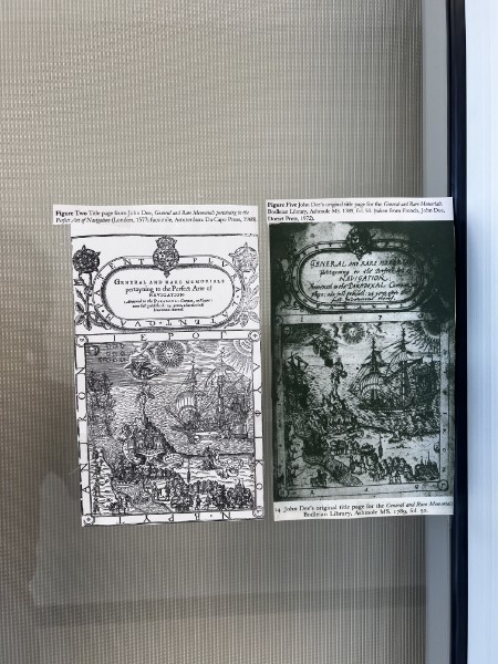 Two reproduced early navigation title pages pinned side by side to a glass panel.