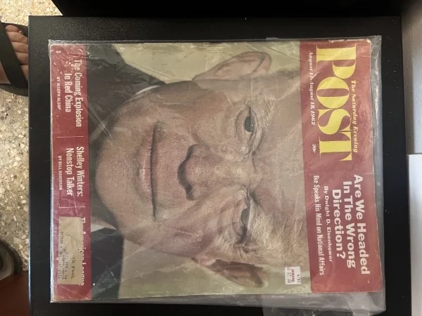 A Saturday Evening Post cover preserved in a sleeve.
