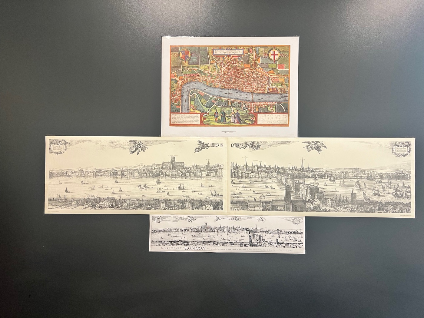 Historical maps and city views displayed at the Center for History and Culture.